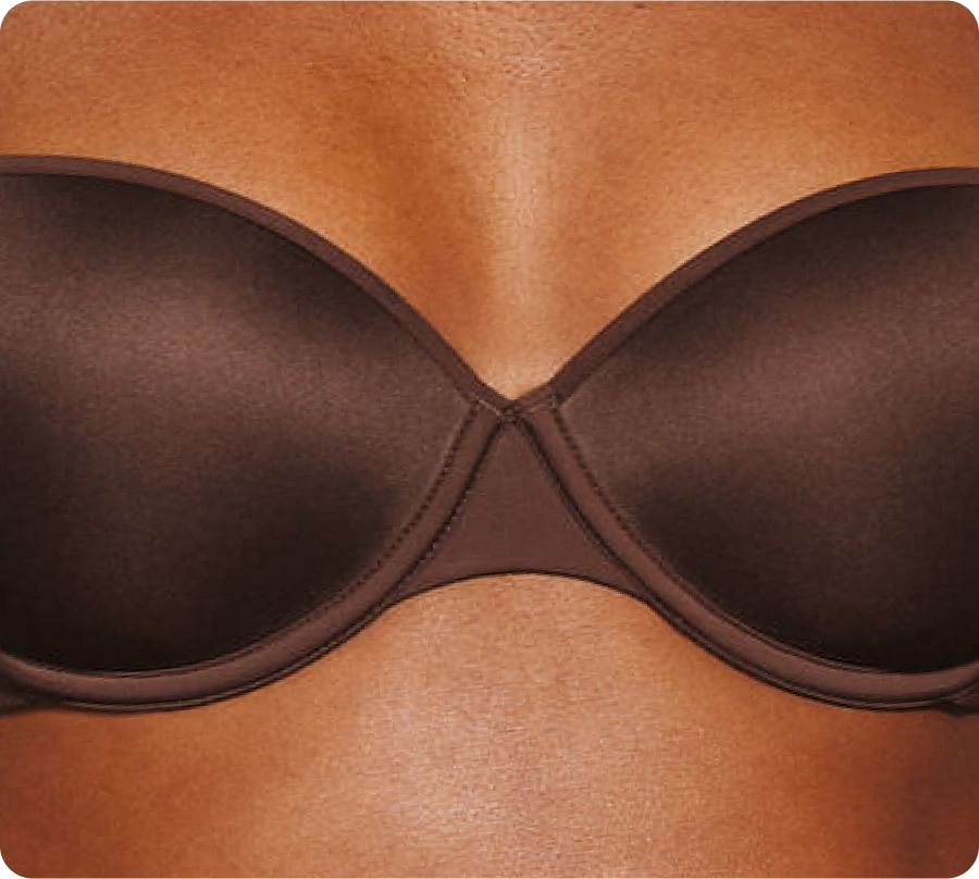 Female boobs in black bra #1 Framed Print